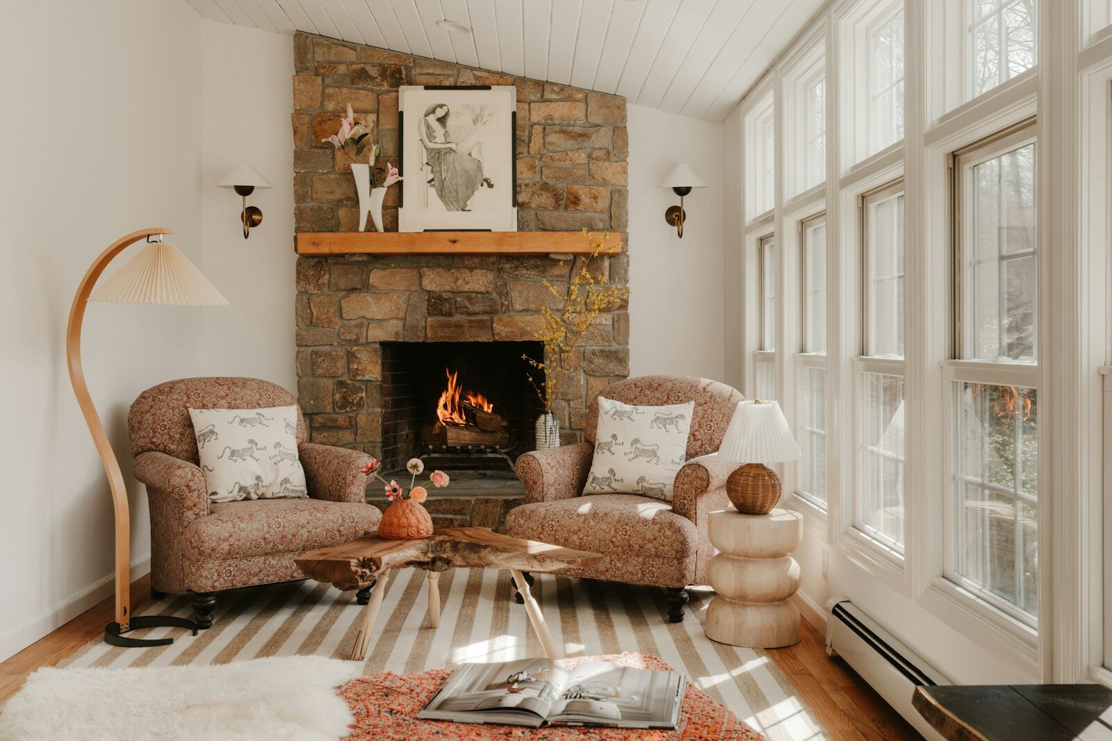 Cozy living room with fireplace and two armchairs